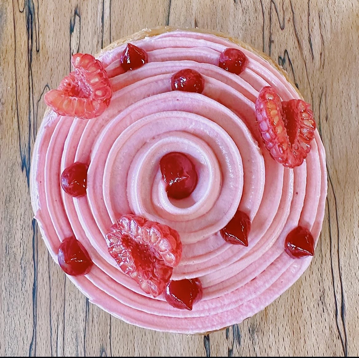Pink raspberry swirl tart from above